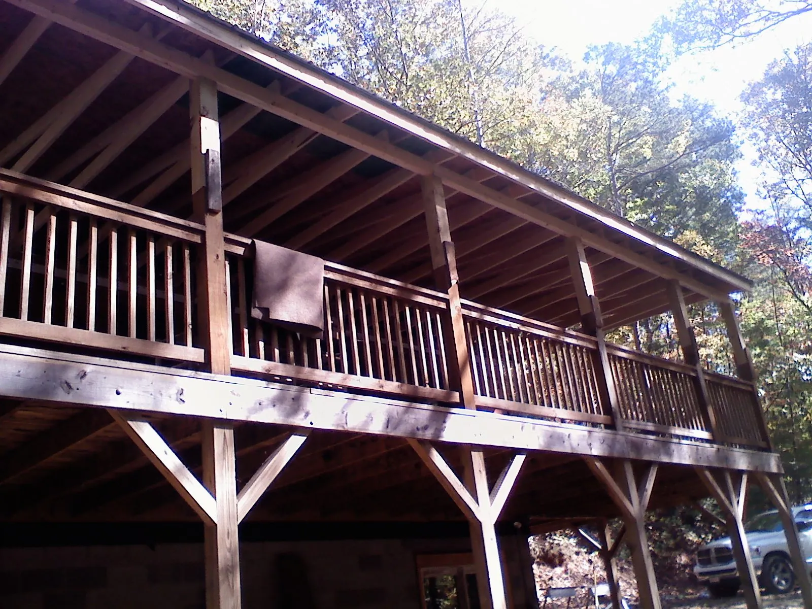 Timber framing under a new elevated porch and deck — Roof Leak Repair in Nashua by Roofing Brothers